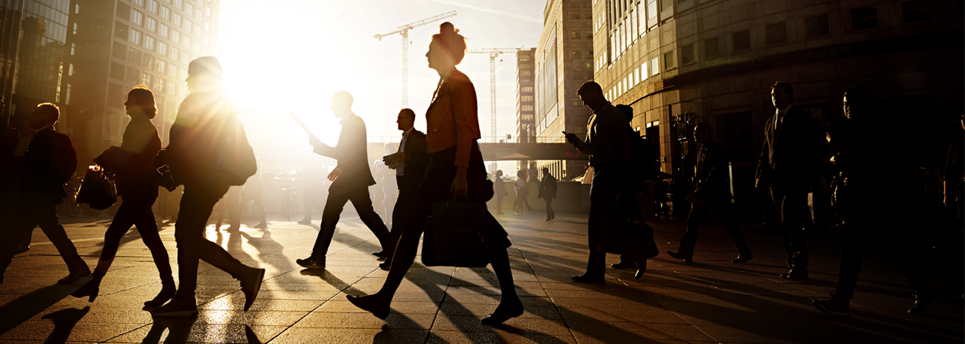 Professionals walking in a city environment